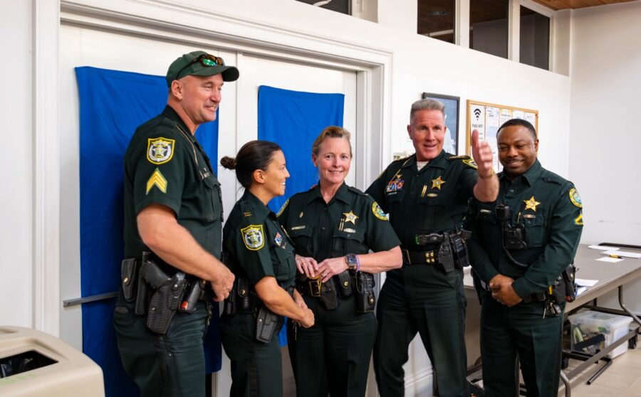 a group of police officers standing next to each other