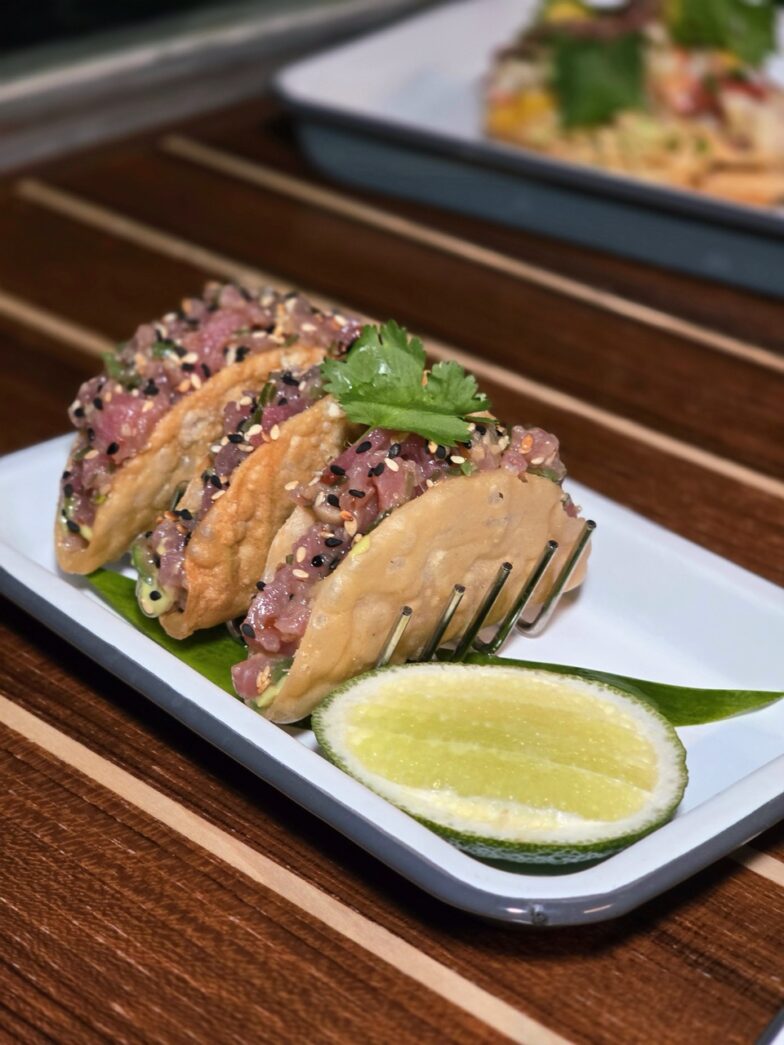 a plate of food on a wooden table