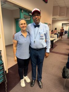 a man and a woman standing in a room