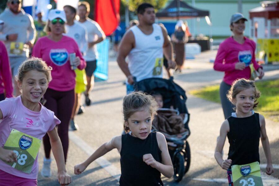 a group of children running in a race