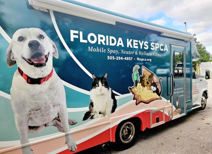 a truck that has a dog on the side of it