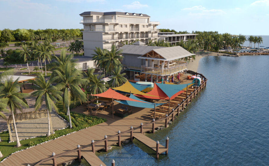 an aerial view of a resort on the water