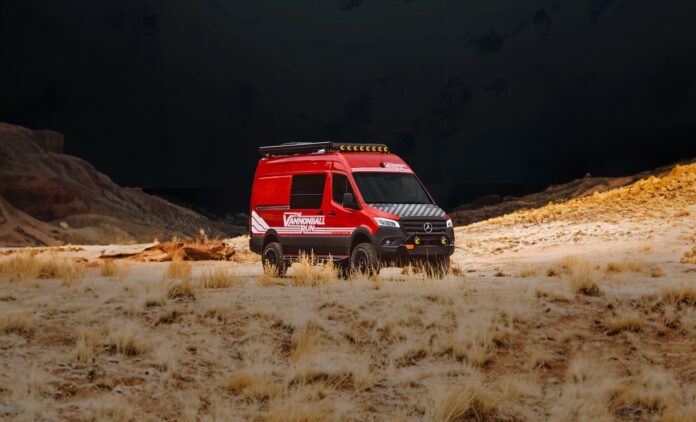 a red van is parked in the desert