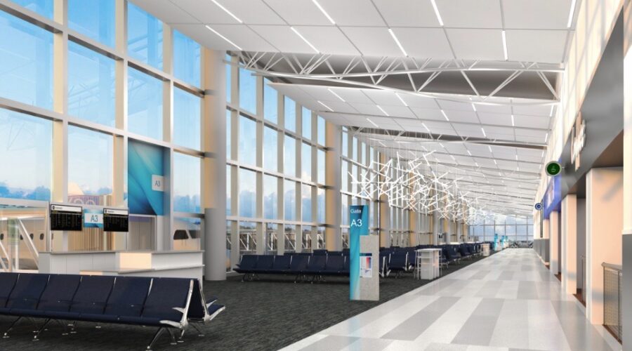 an empty airport terminal with lots of windows