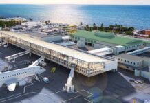 an aerial view of an airport with an airplane on the tarmac