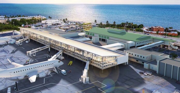 an aerial view of an airport with an airplane on the tarmac