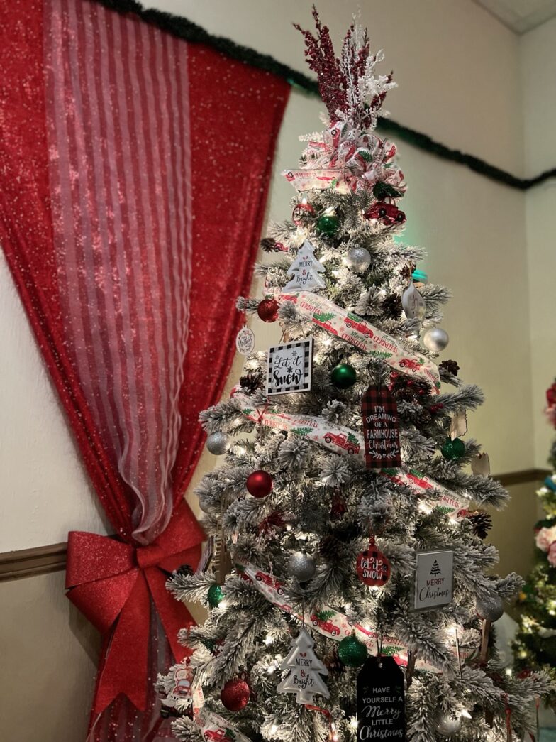 a decorated christmas tree in a room