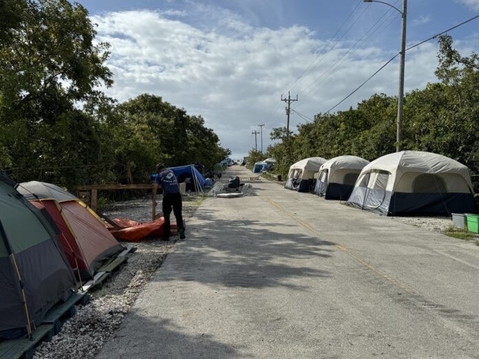 a row of tents sitting on the side of a road