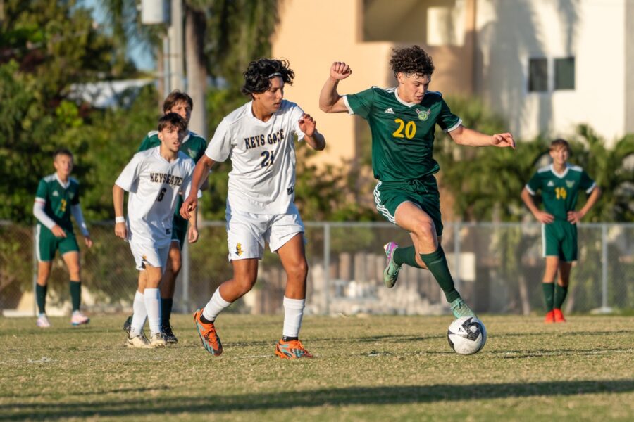 a group of young men playing a game of soccer