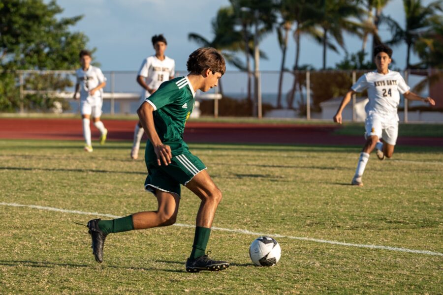 a group of young men playing a game of soccer