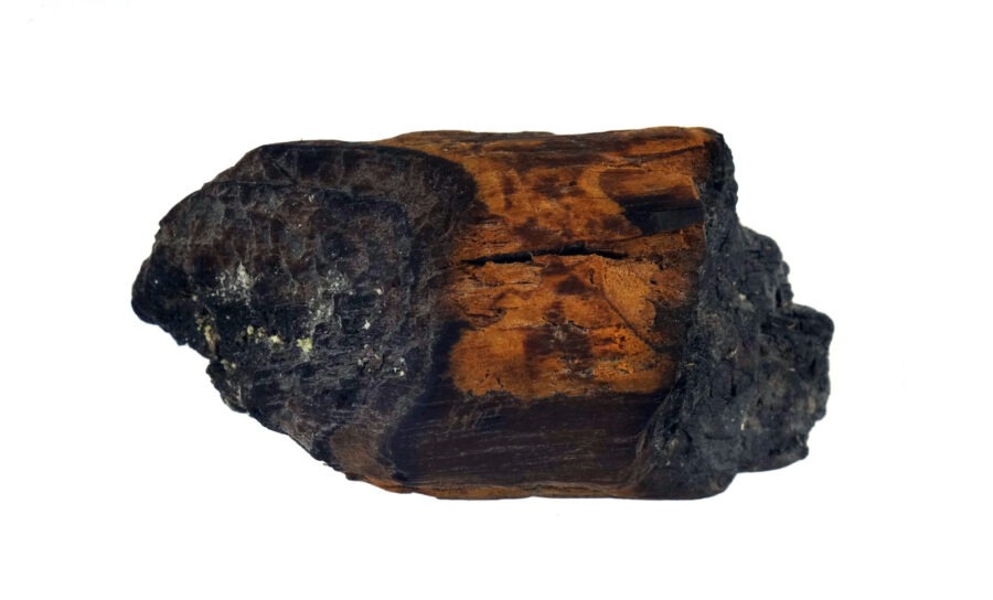 a piece of wood that is brown and black