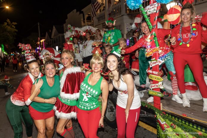 a group of people dressed in christmas costumes