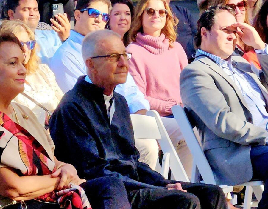 a group of people sitting next to each other