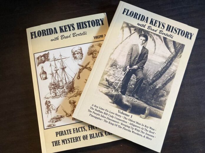 two florida keys history books on a table