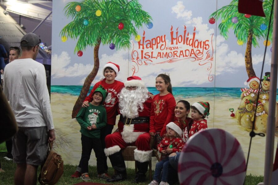 a group of people dressed as santa clause posing for a picture