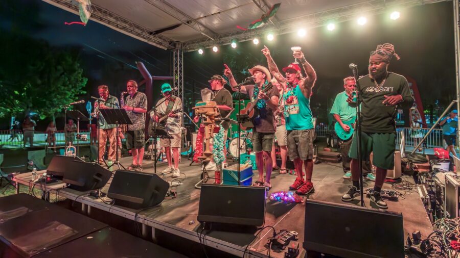 a group of people standing on top of a stage