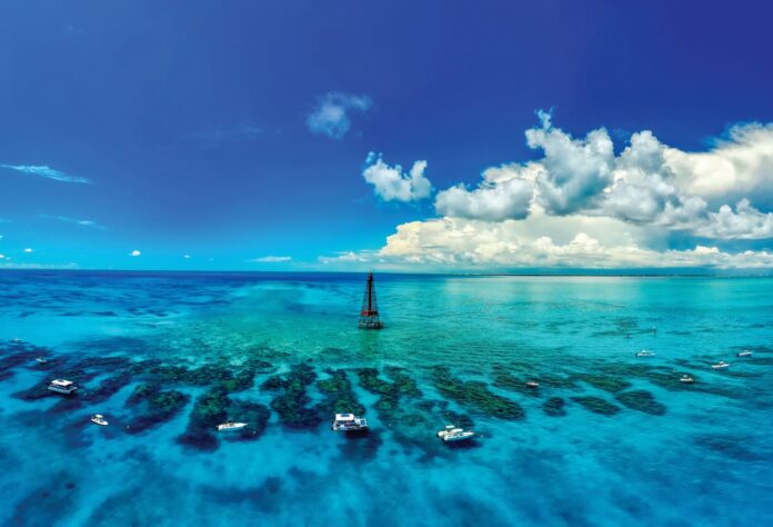 a boat floating on top of a large body of water