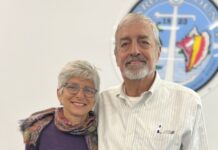 a man and a woman standing next to each other