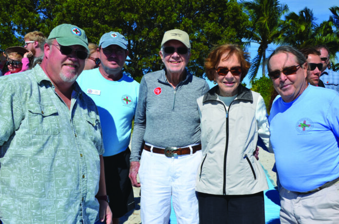 a group of men standing next to each other