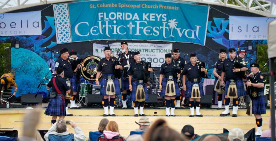 a group of people that are standing on a stage