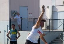 a group of men playing a game of frisbee