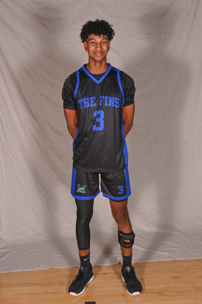 a basketball player is posing for a picture