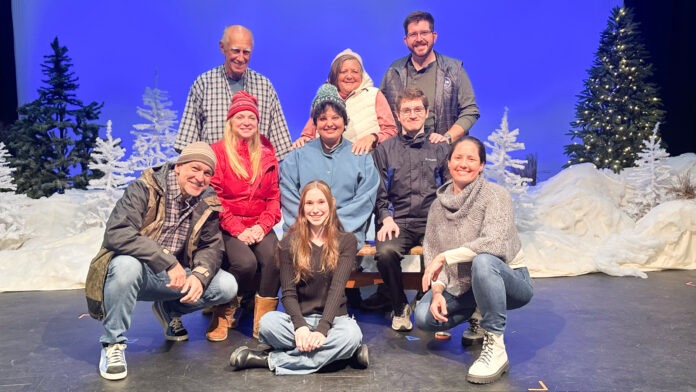 Key Players cast a group of people posing for a picture on a stage