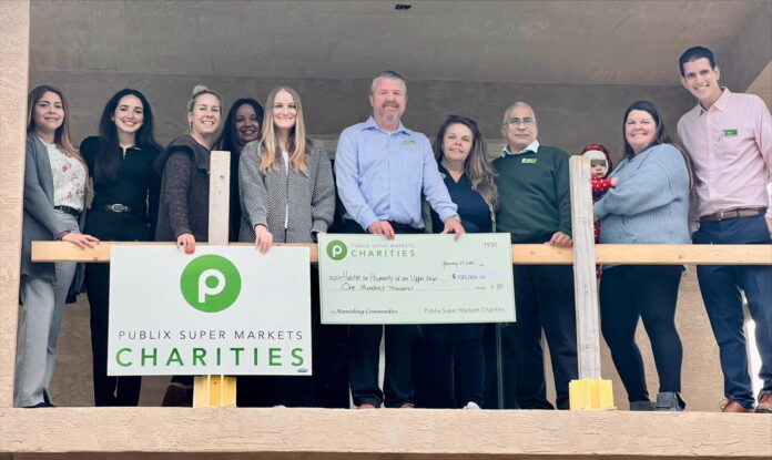 a group of people standing next to each other