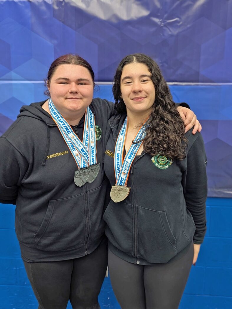 a couple of women standing next to each other