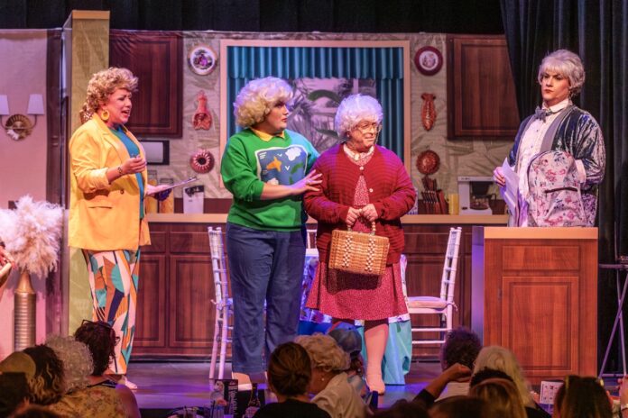 a group of people standing on top of a stage
