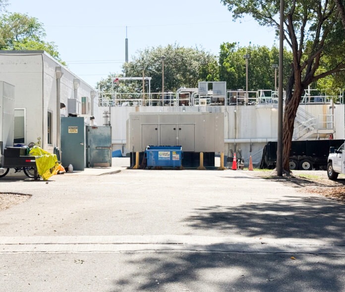 North Plantation Key pump station a street lined with white buildings and trees
