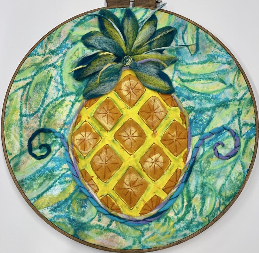 a painting of a pineapple on a wall