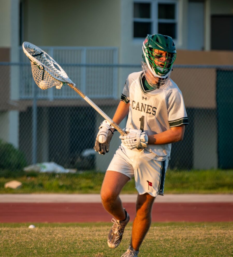 a lacrosse player in action on the field