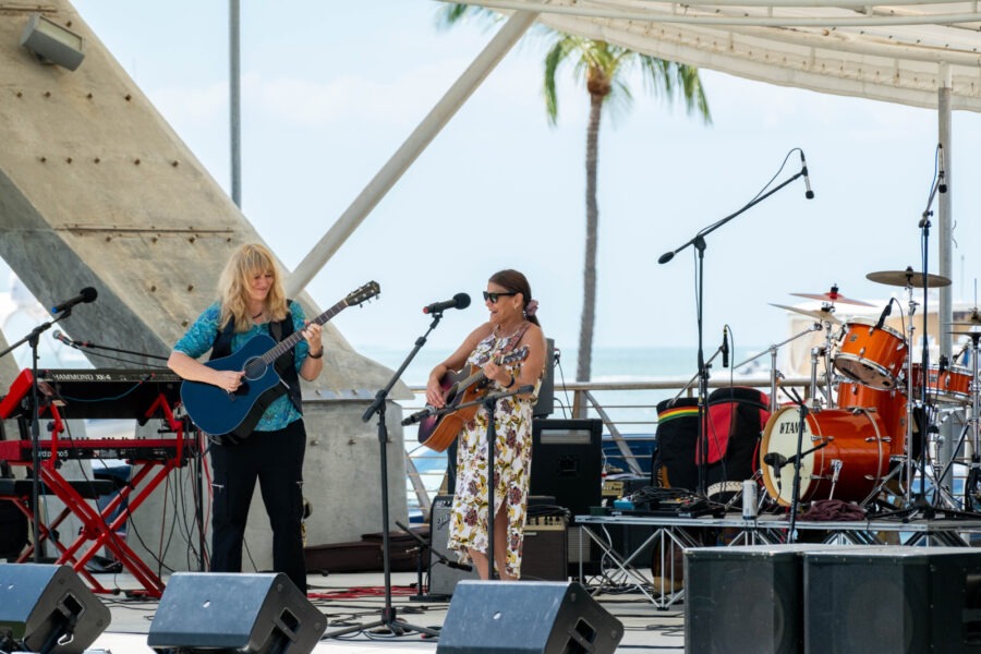 a group of people that are standing on a stage