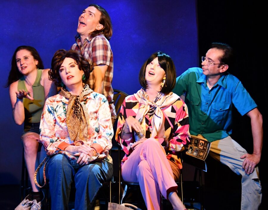 a group of people sitting on top of a chair