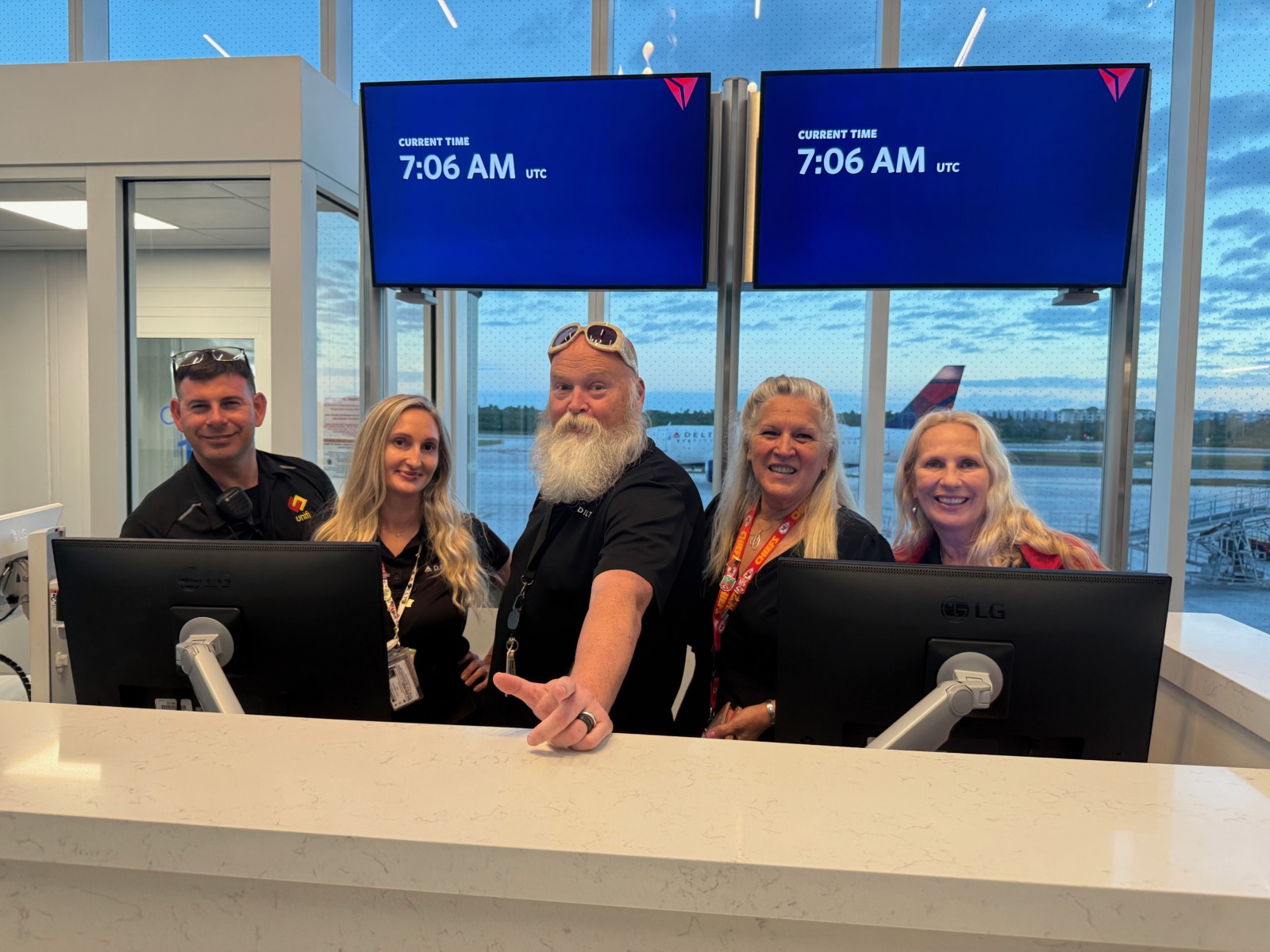 a group of people standing in front of a counter