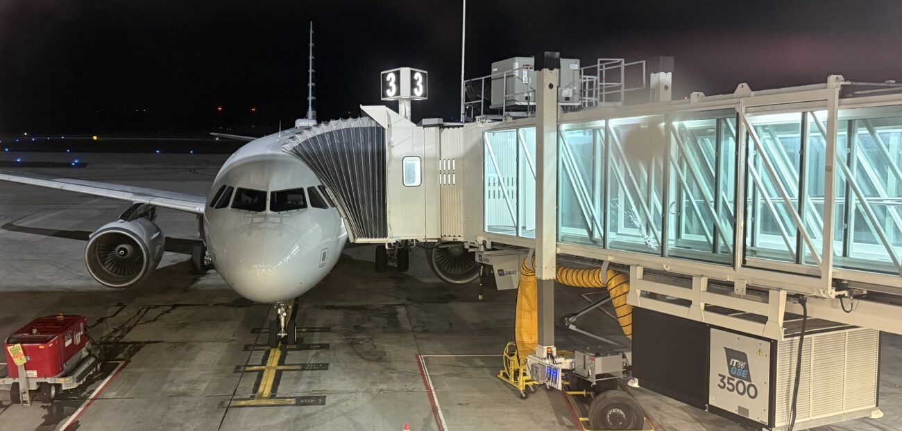 a large jetliner sitting on top of an airport tarmac
