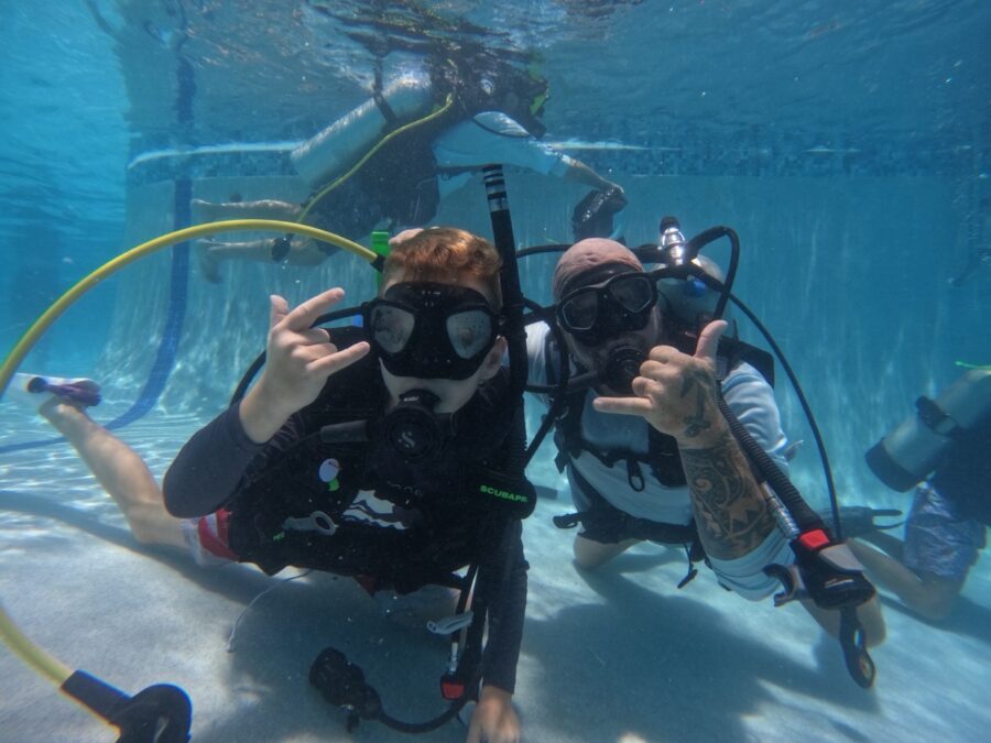 a couple of people that are in the water