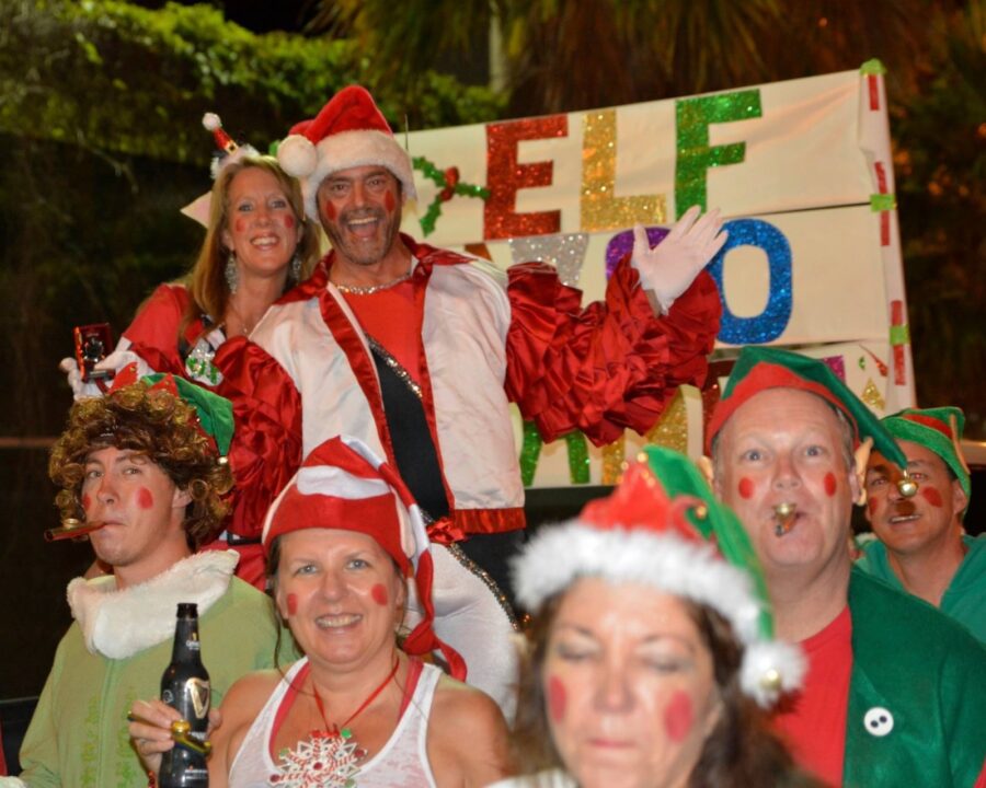 a group of people dressed up for christmas