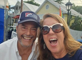 a man and a woman pose for a picture