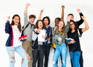a group of young people standing next to each other