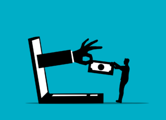 a person reaching out to grab something out of a computer screen