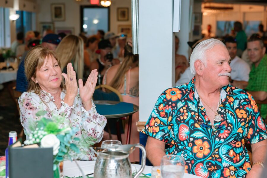 a group of people sitting around a table