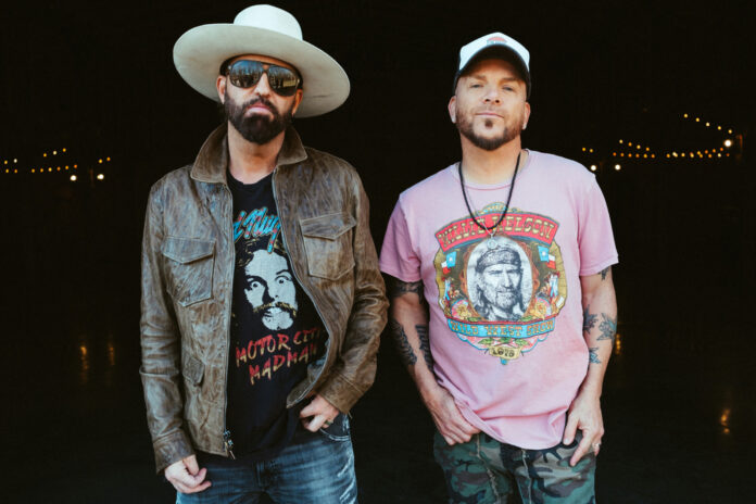 LoCash photo by Jenn Littleton a couple of men standing next to each other
