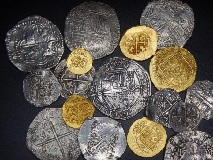 DSCN6737 a bunch of coins sitting on top of a table