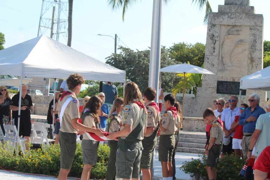 a group of people that are standing in the street