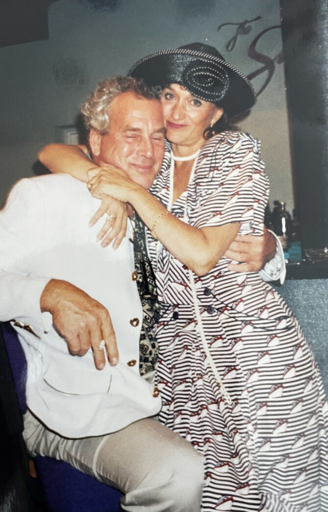 a man and a woman hugging each other