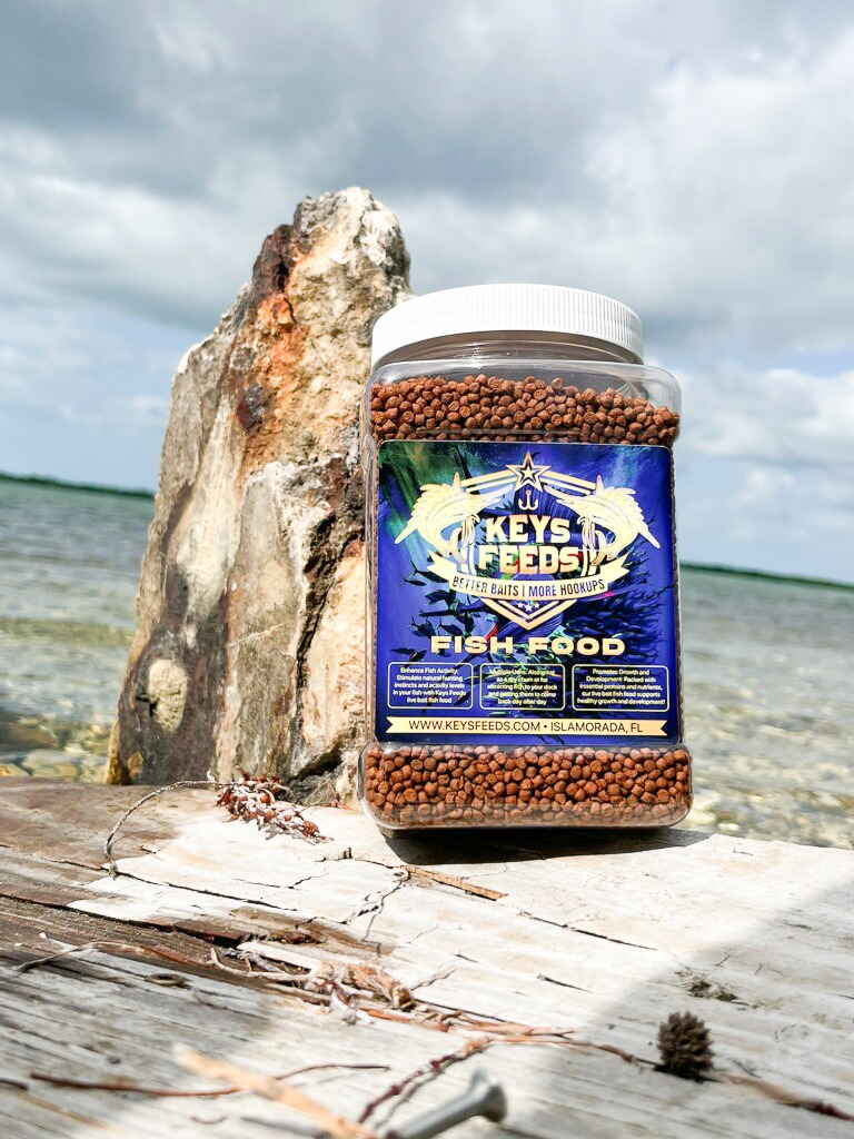 a jar of fish food sitting on top of a wooden table