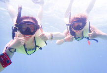 a couple of people that are in the water