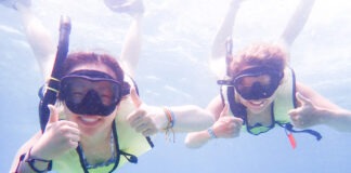 a couple of people that are in the water